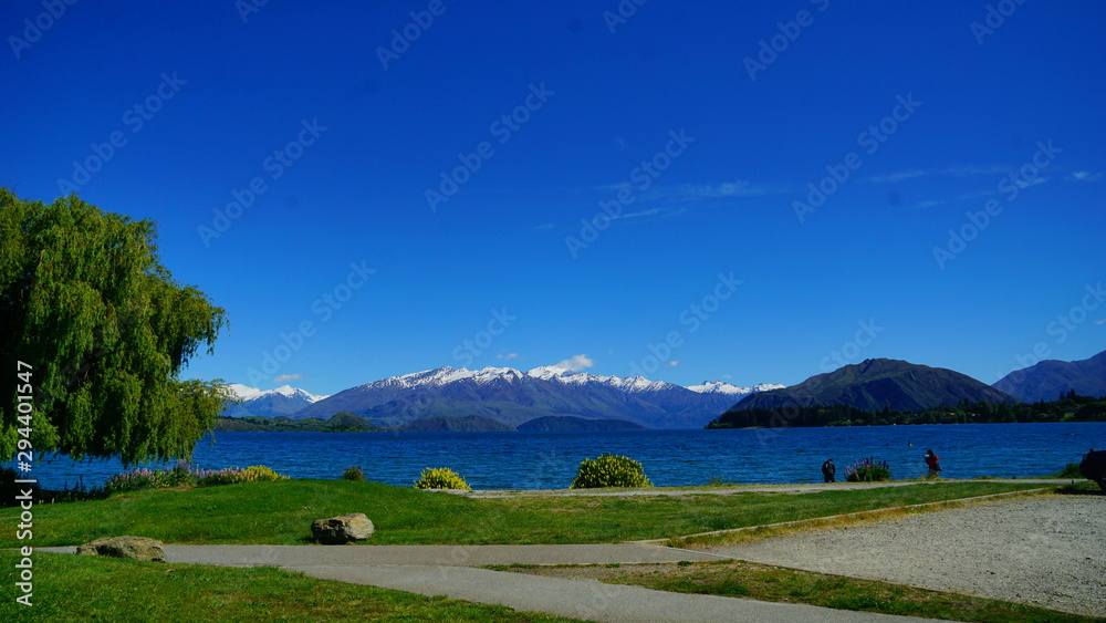 A beautifil scene and blue sky in Wanaka lake in New Zealand