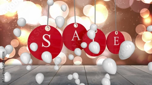 SaleÂ graphicÂ on red tags with balloons photo