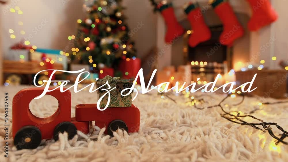 Feliz Navidad written over fireplace at Christmas time