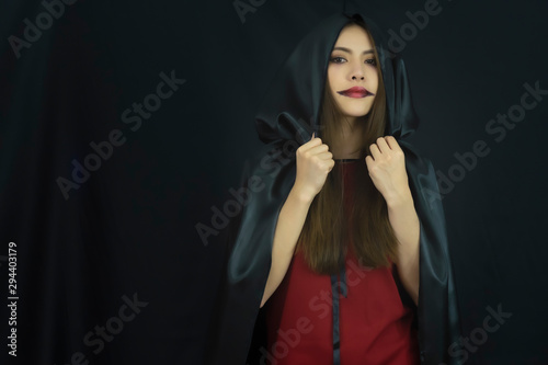Portrait of Halloween witch girl. Hallowwen concept.