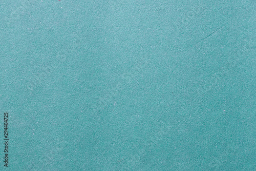 Clean blue paper texture with simple surface. High resolution photo. Color paper light blue. Empty paper backgrounds.
