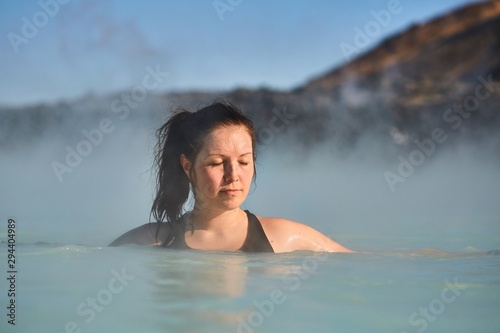 Enjoying hot thermal spa pool in Iceland