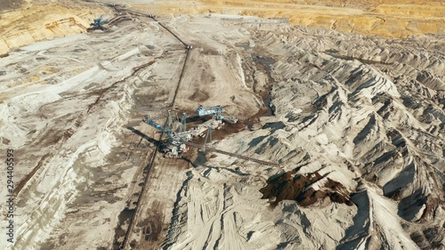 Coal mine, open pit mining, drone aerial view, huge machines