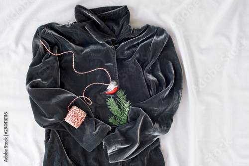Рlushy jacket decorated for Christmas. Hygge concept. © Modest Things