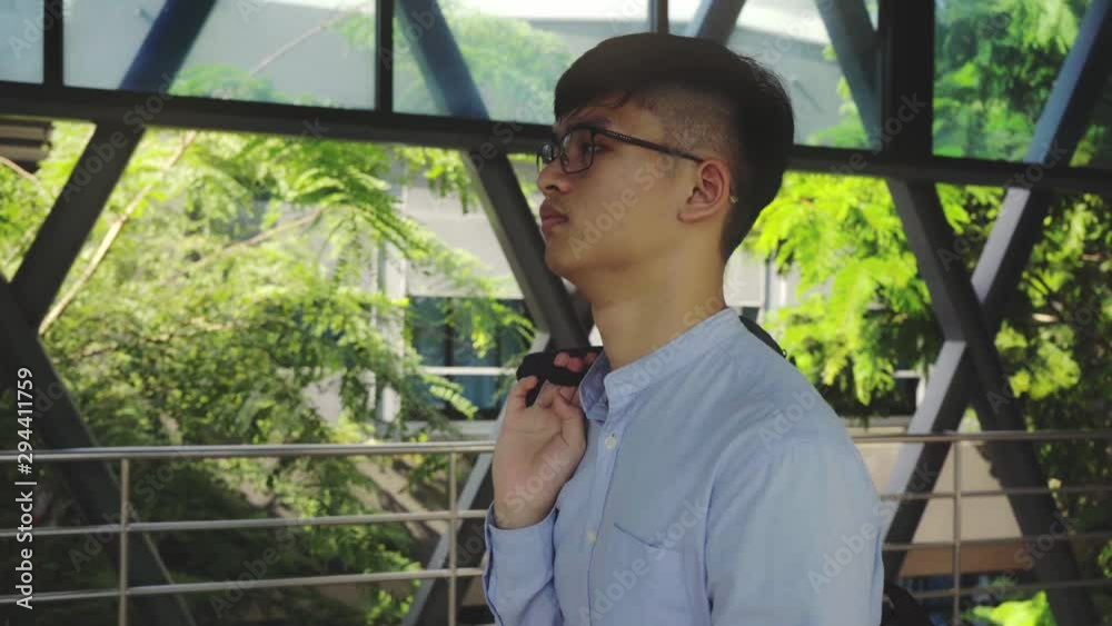 Male university students rushed into the classroom in the morning, hurried to attend school before teaching Male university students rushed into the classroom in the morning, hurried to attend school before teaching