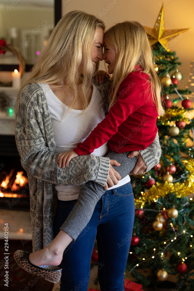 Family at home at Christmas time Family at home at Christmas time