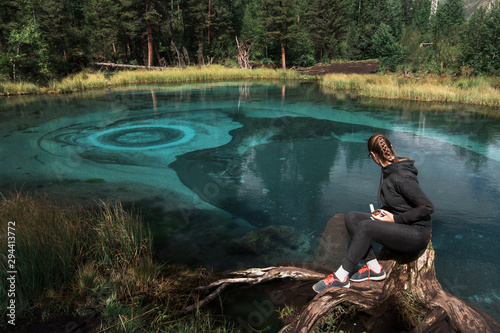 Woman at Beautiful Geyser l...
