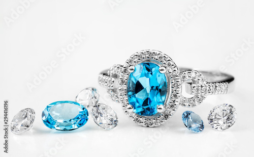 Diamond ring. Ring with diamonds and  large topaz. Topaz and diamond stones. photo