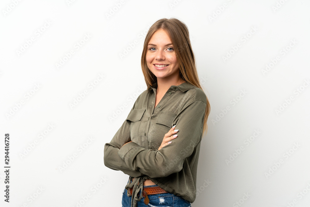 Lithuanian blonde girl over isolated white background with arms crossed and looking forward Lithuanian blonde girl over isolated white background with arms crossed and looking forward