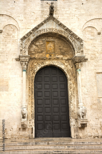 Door of Basilica of Saint Nicholas in Bari, Italy © axynia