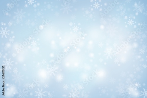Blue Christmas abstract texture background with snowflakes winter and bokeh lights. blurred beautiful shiny Christmas new year, use wallpaper backdrop and your product. 