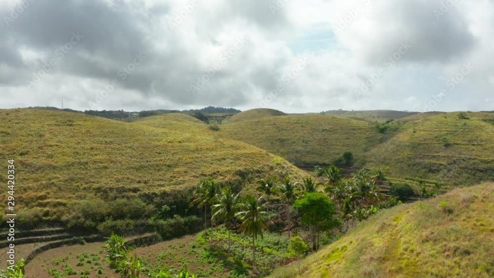 aerial view of hills in bali, low altitude forward shot aerial view of hills in bali, low altitude forward shot