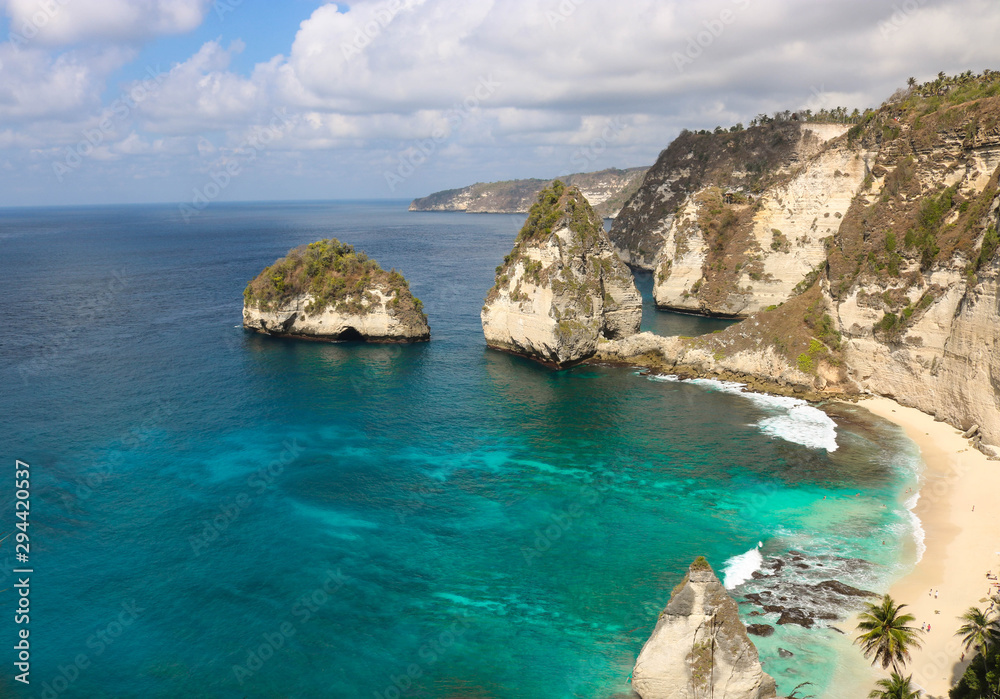 Panorama view of diamond beach in Nusa Penida Island. Bali, Indonesia. Landscape view of diamond beach with rocky and turquoise sea. diamond beach is tourist attraction. Travel concept