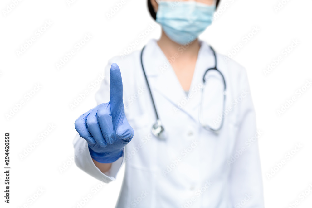 Woman doctor pointing at invisible screen, warning about flu Woman doctor pointing at invisible screen, warning about flu