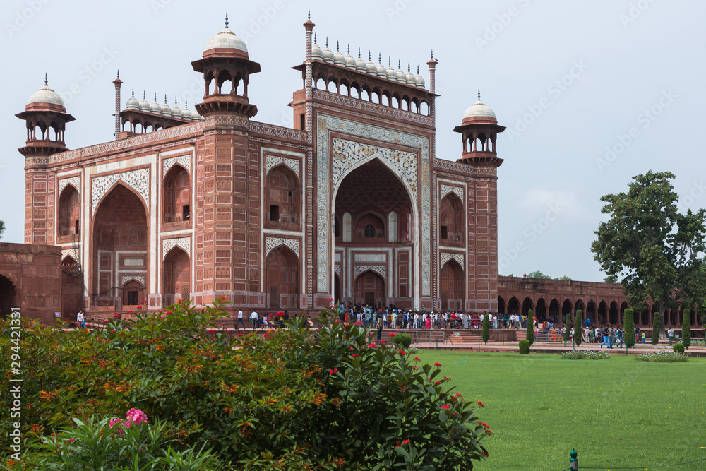 Agra, India - August 13, 2019: Entrance to Taj Mahal with people in Uttar Pradesh in India