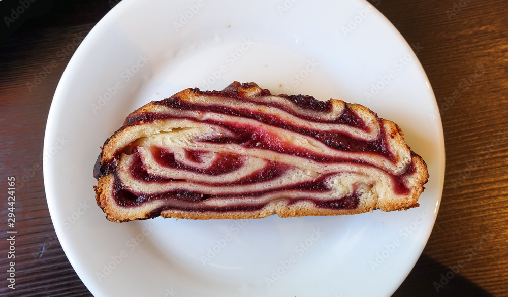 Homemade baking. Sliced cupcake on a plate. Stuffed pastries Homemade baking. Sliced cupcake on a plate. Stuffed pastries