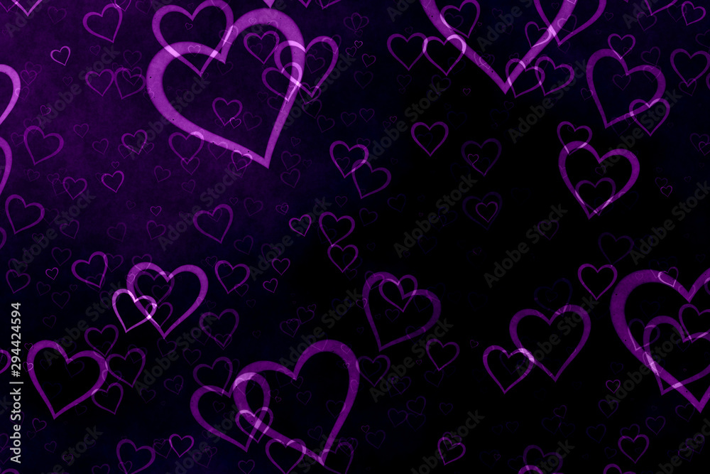 Purple hearts on black background. Valentine's Day abstract background with hearts Purple hearts on black background. Valentine's Day abstract background with hearts