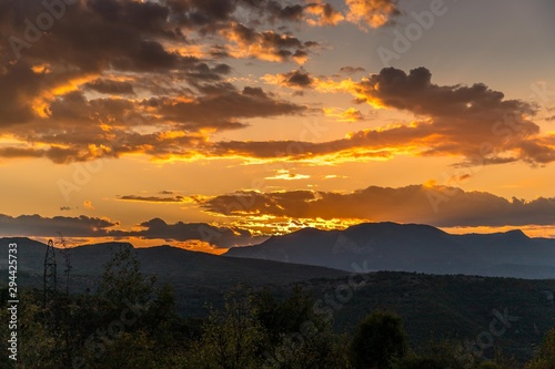 Mountain sunset golden sky