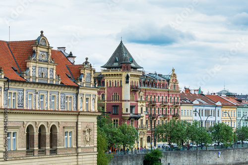 Landscape of Vltava river and buildings at the riverside, View from the Charles Bridge, one of the most famous touristic destination.