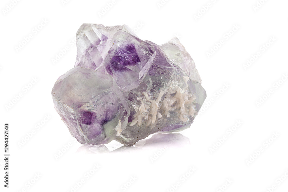 Macro mineral stone Fluorite crystal on a black background