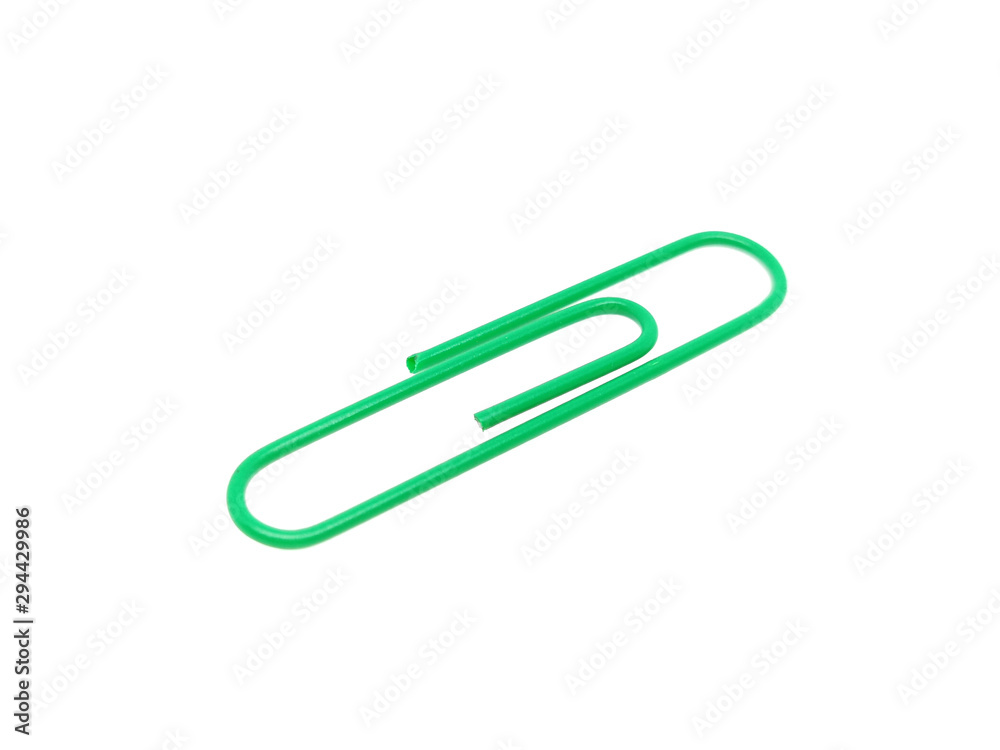 Single green paper clip on a white background. One paper clip image Single green paper clip on a white background. One paper clip image