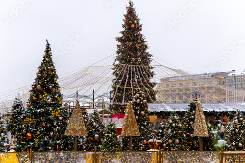 Closeup of Christmas tree with light  snow flake and decorations. Christmas and New Year holiday background