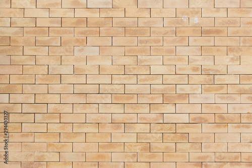 closeup view of orange brick wall or floor background textured.