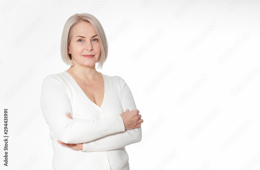 Happy woman emotionally posing in a studio. Happy woman in yellow bright sweater on white background Happy woman emotionally posing in a studio. Happy woman in yellow bright sweater on white background