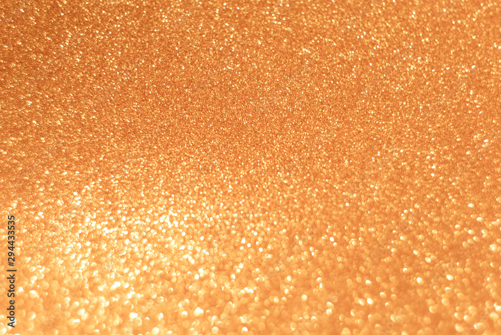 Defocused lights  blurred abstract gold color background