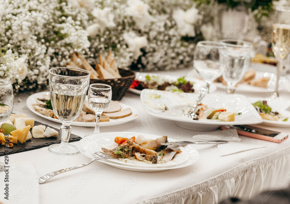 Empty dish with fork and spoon on background