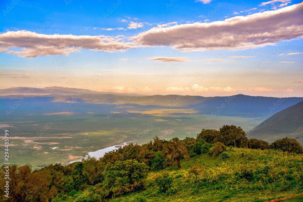 sunset over ngorongoro crater - obrazy, fototapety, plakaty 