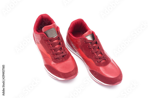 Red sport shoes isolated on white background.