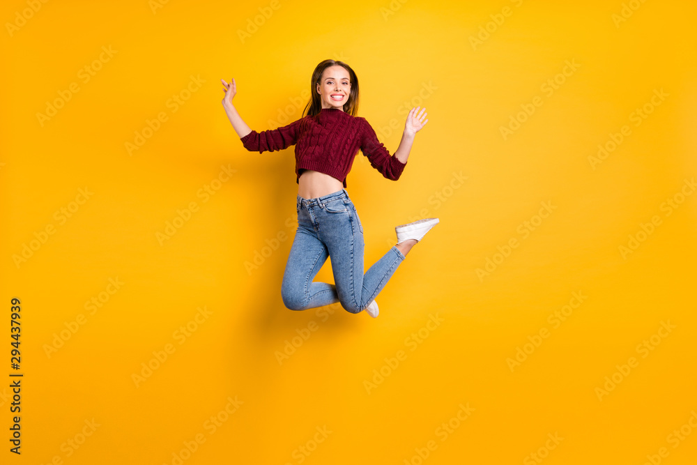Full size photo of pretty yourth looking with toothy smile wearing maroon pullover isolated over yellow background