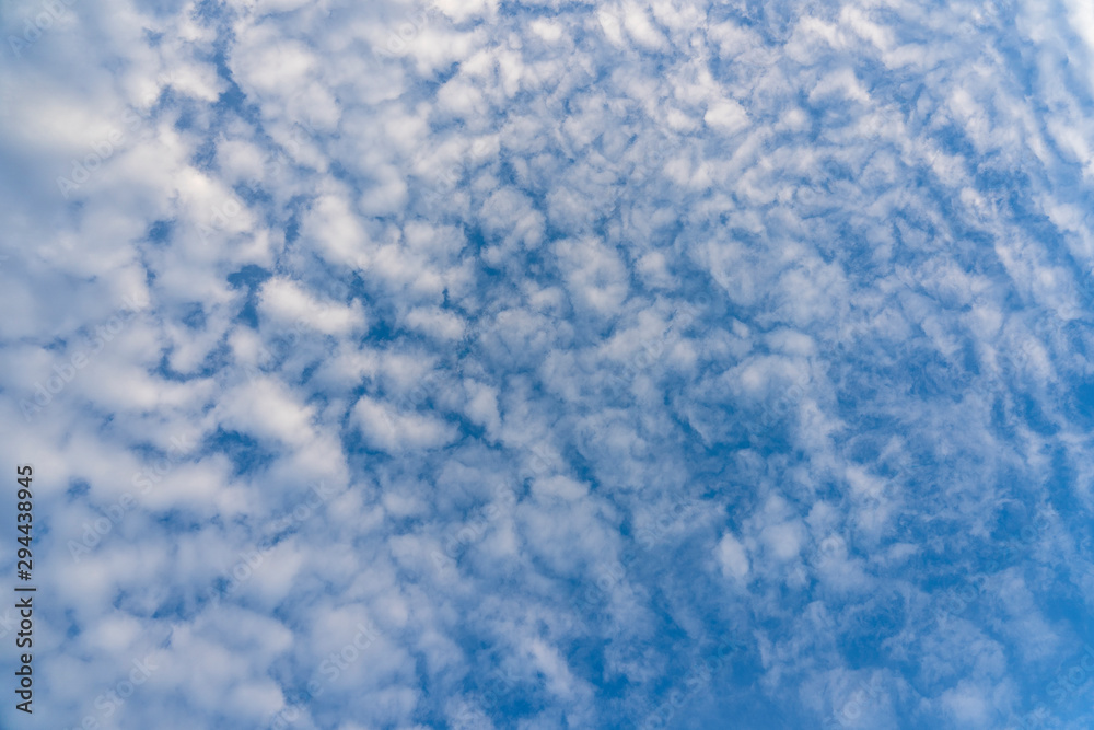 White clouds over blue sky. Background sky with clouds. White clouds over blue sky. Background sky with clouds.