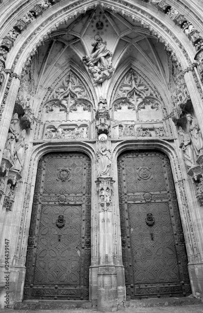 TOLEDO - MARCH 8: South gothic portal of Cathedral Primada Santa Maria de Toledo on March 8, 2013 in Toledo, Spain.