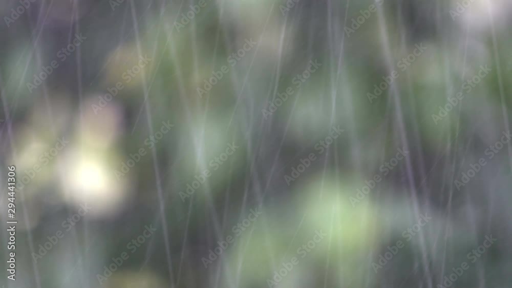 Rain falling fast, blurred background