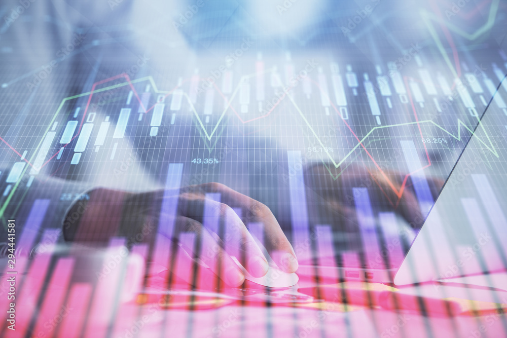 Double exposure of forex graph with man working on computer on background. Concept of market analysis. Double exposure of forex graph with man working on computer on background. Concept of market analysis.
