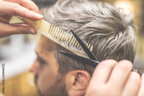 Barber cutting and modeling...