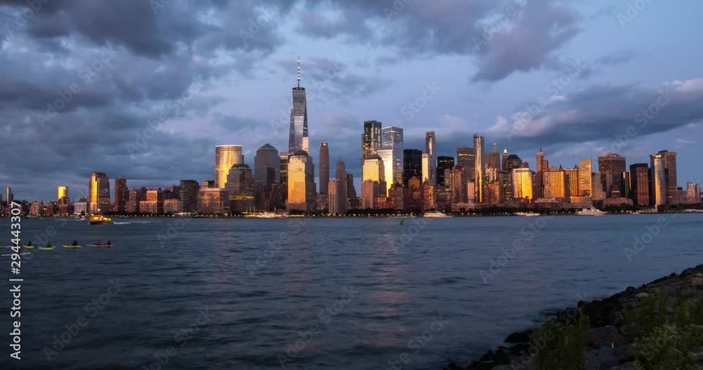 Manhattan skyline time lapse at sunset day to night transition. New York City view timelapse.