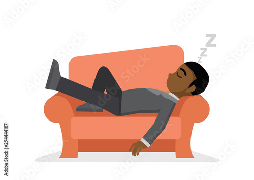 African businessman taking a nap on sofa.