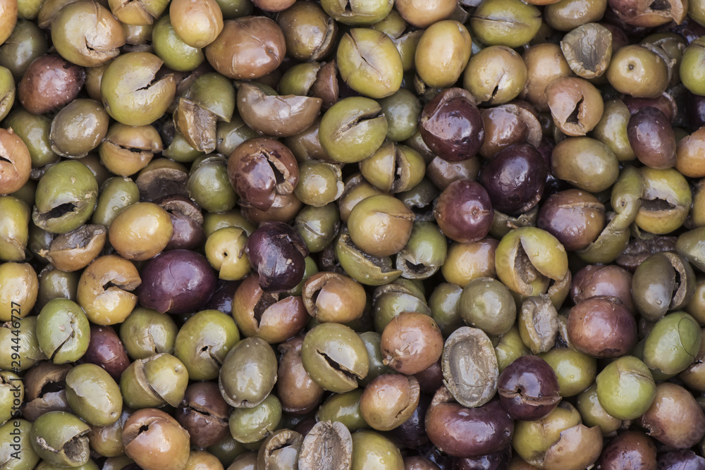Homemade and boneless olives prepared to dress them in the traditional Cordoba style after removing the bone by hand Homemade and boneless olives prepared to dress them in the traditional Cordoba style after removing the bone by hand