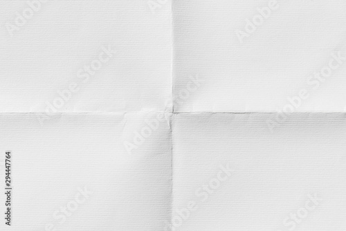 Paper folded in four, texture background photo