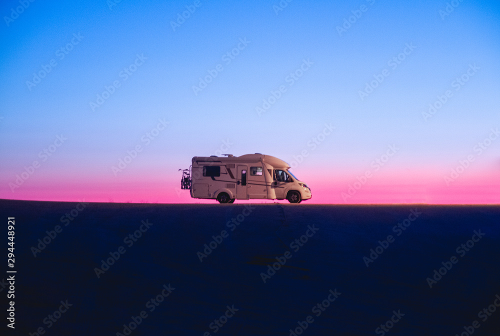 Adventure campervan motor home at sunset Adventure campervan motor home at sunset