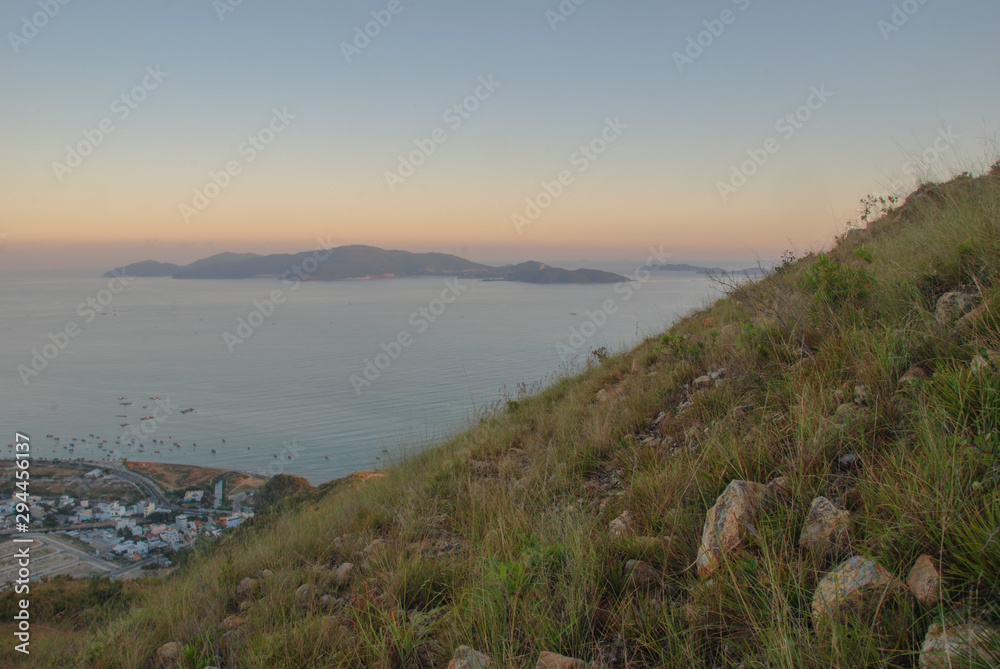 Fototapeta premium Sunset over Nha Trang city, Vietnam 