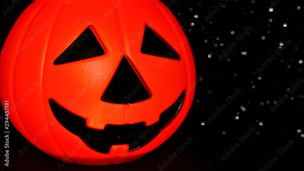 Halloween Theme, Pumpkin Mask isolated on a dark background. Halloween Theme, Pumpkin Mask isolated on a dark background.