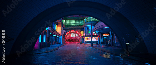 Street of a futuristic city, starting with an arch in a tunnel. Photorealistic 3D illustration. Night scene with neon lighting. City landscape in the style of cyberpunk. photo