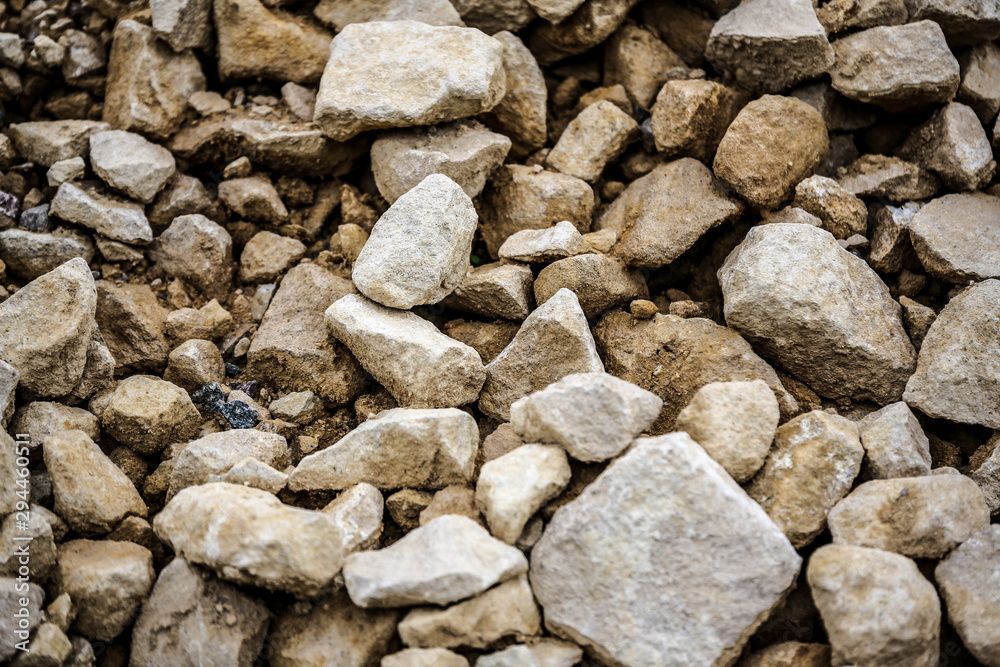 An abstract close up photo of a variety of different sized stones from a quarry. Perfect for background use An abstract close up photo of a variety of different sized stones from a quarry. Perfect for background use