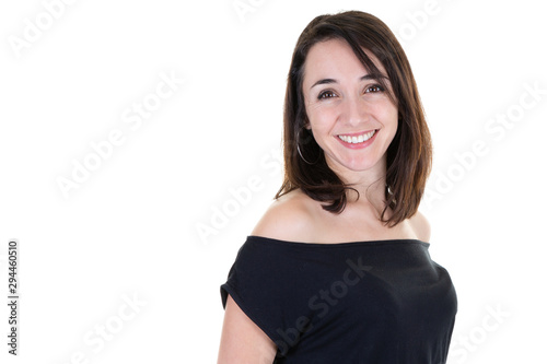 Young woman over white wall laughing looking aside copy space