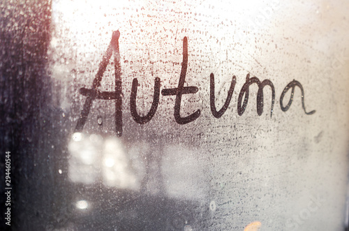 hand inscription on the glass autumn, autumn mood, cold weather, rainy, wet