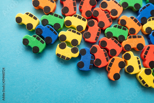 mini toy rubber cars on blue background